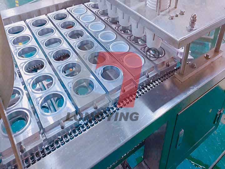 龍應(yīng)全自動(dòng)灌裝封口機(jī) 龍應(yīng)全自動(dòng)灌裝封口機(jī)