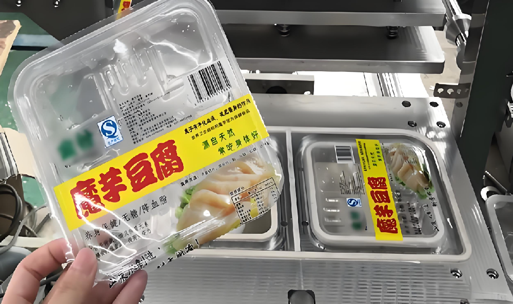 龍應(yīng)魔芋豆腐全自動封口機