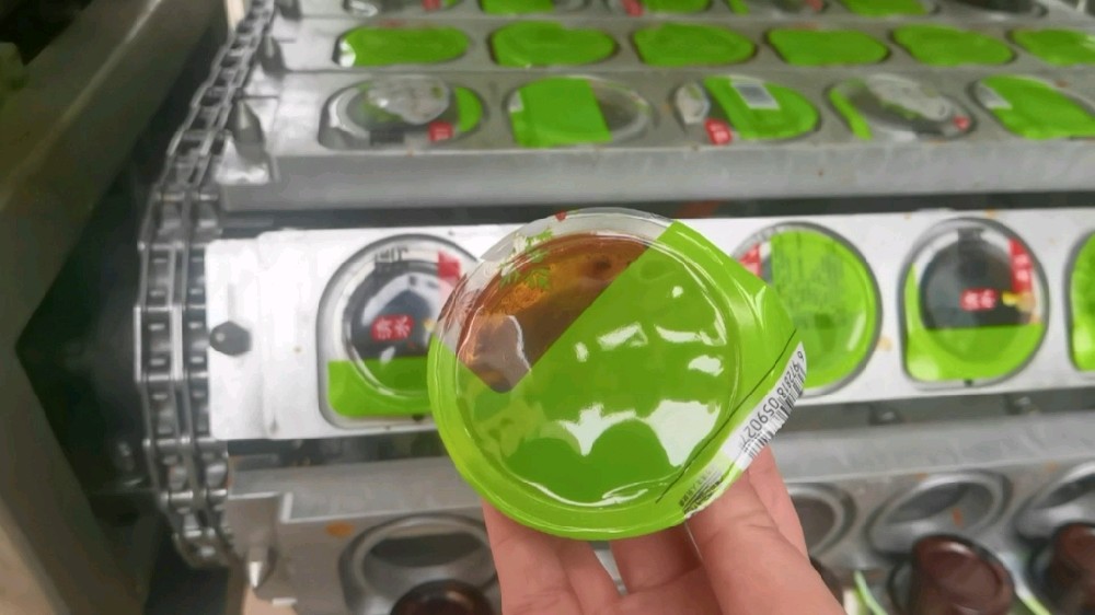 龍應(yīng)一出八醬料灌裝封口機